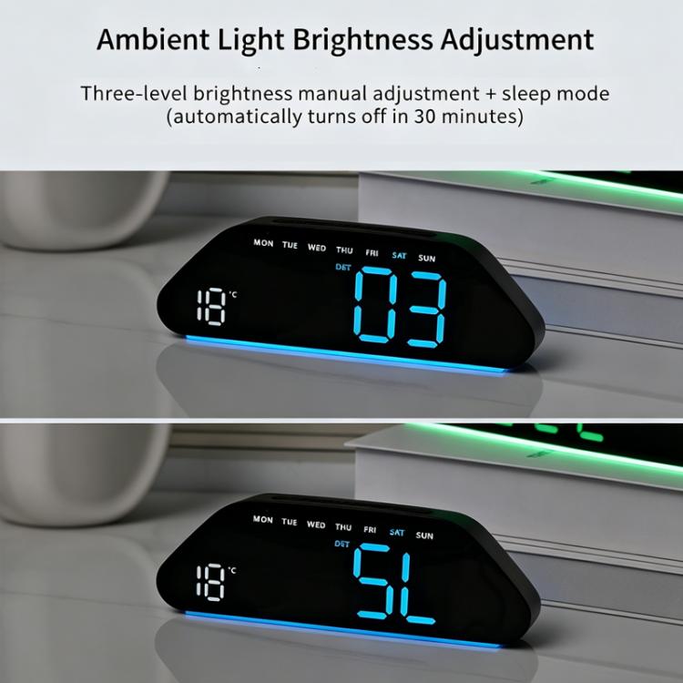 Black digital alarm clock with blue LED time display and glowing blue edge light