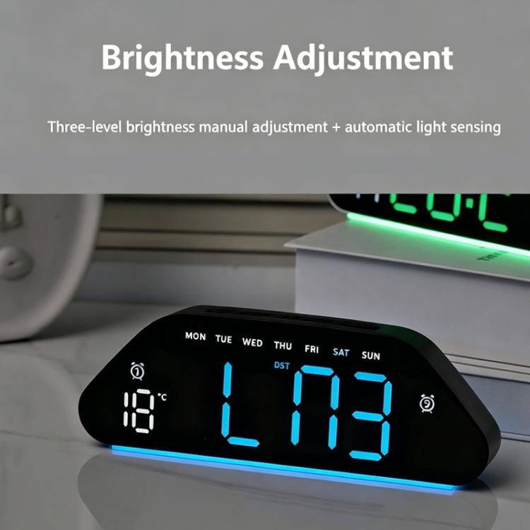 Black digital alarm clock with blue LED time display and bright blue underglow