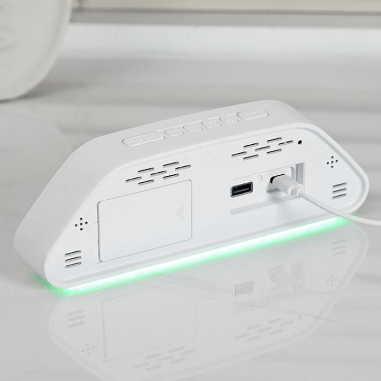 Digital alarm clock with side ports, white body and green LED glow