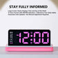 LED mirror desktop alarm clock with large pink digits, black face, pink base stand