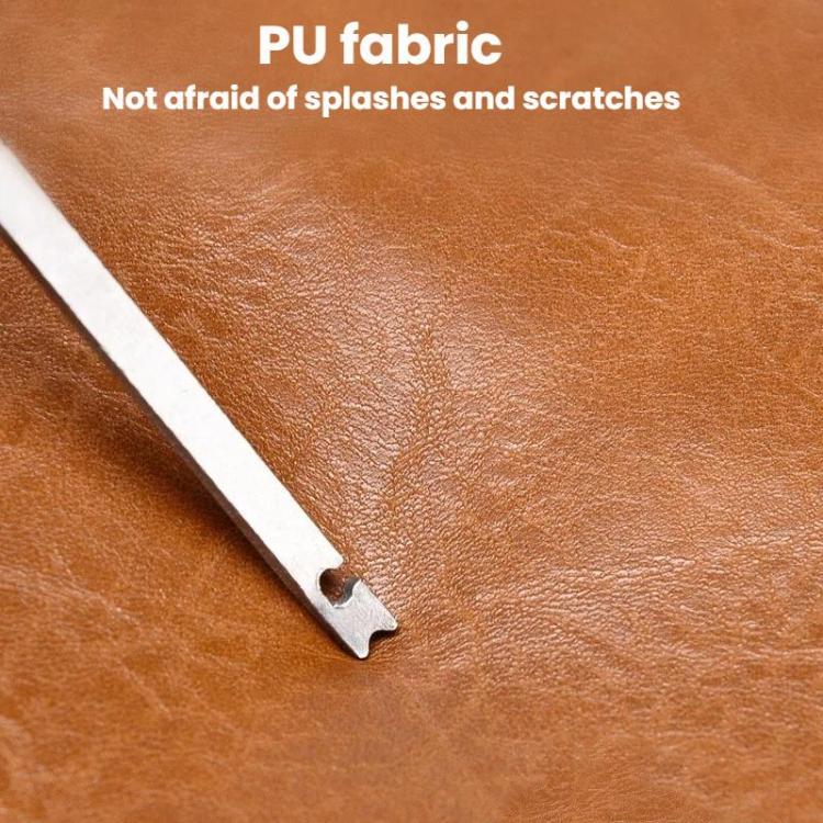 Close-up of tan PU bag material with reinforced edge stitching and cutout hardware tab