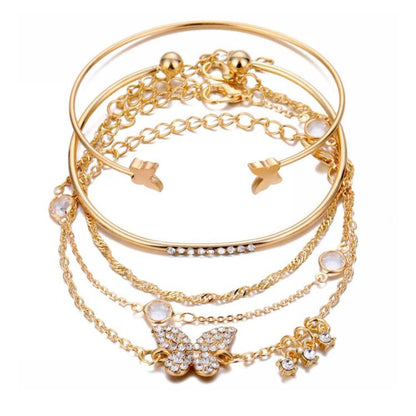 Gold butterfly crystal open-cuff bracelet set with charm chains and rhinestone details