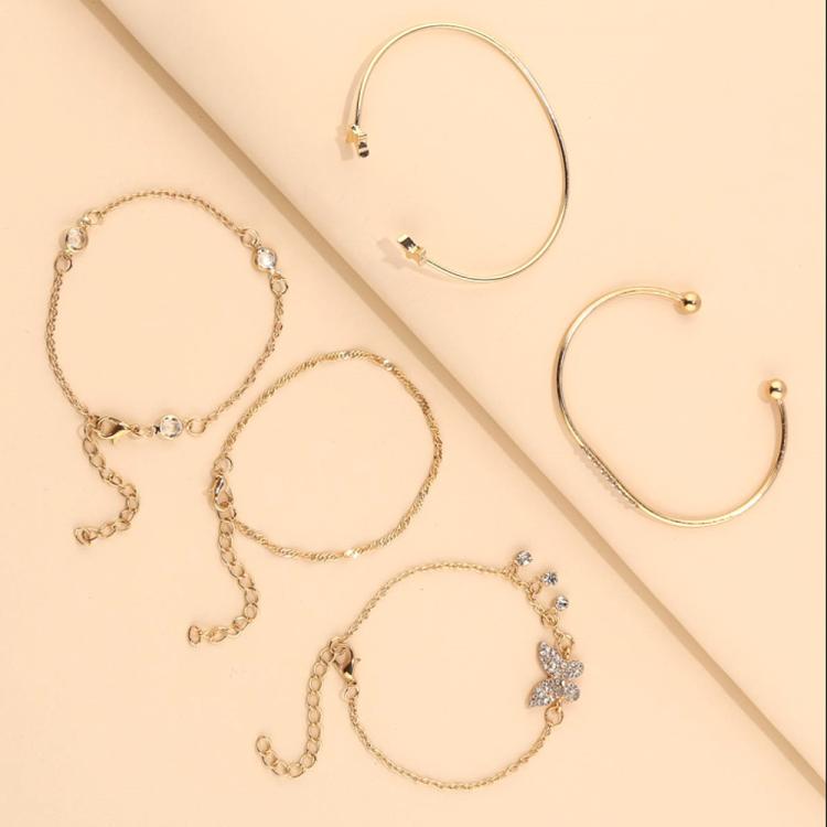 Assorted butterfly charm bracelets with rhinestone open cuffs and chain bangles