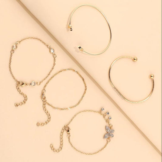 Assorted butterfly charm bracelets with rhinestone open cuffs and chain bangles