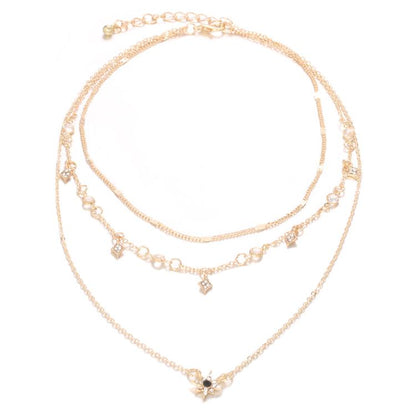 Gold-tone multi-layer star pendant necklace with small star charms