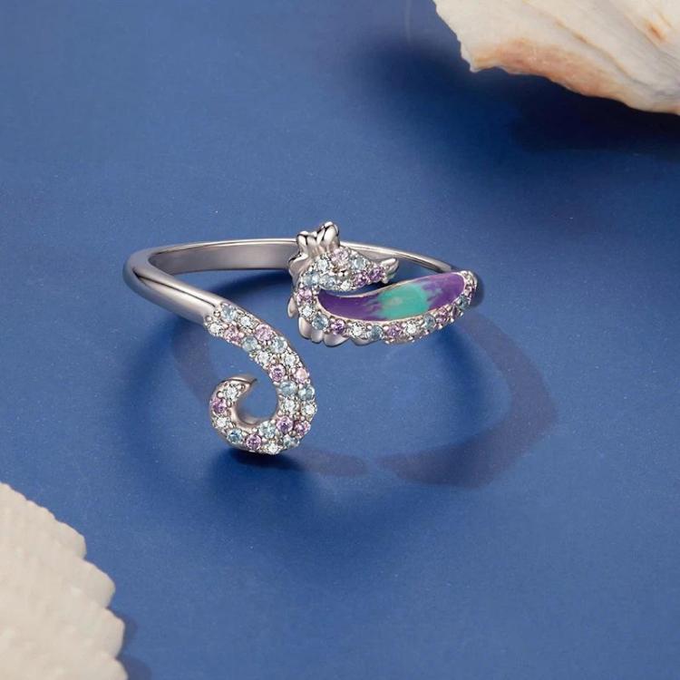 Adjustable seahorse opening ring with silver band and purple-blue oval inlay