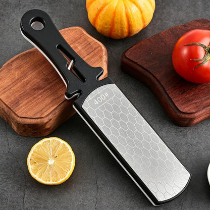Double-sided knife sharpener stone with gray honeycomb grit surface and black handle