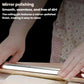 Stainless steel rolling pin pressing dough sheet between hands