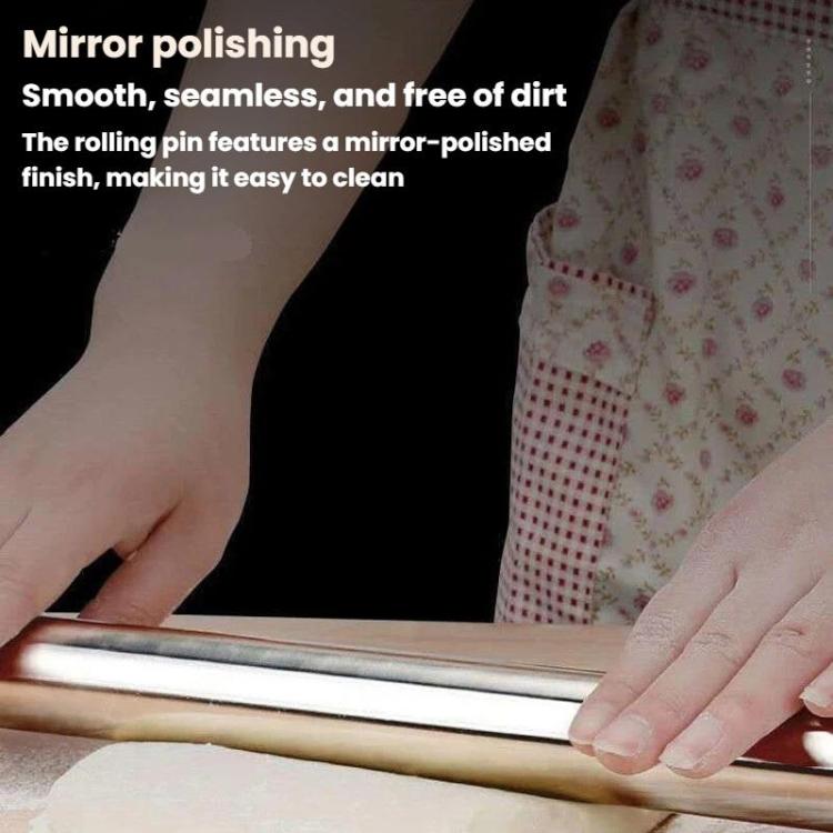 Stainless steel rolling pin pressing dough sheet between hands