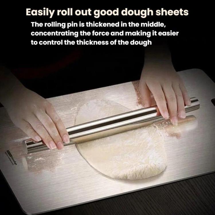 Stainless steel rolling pin rolling out dough on a metal baking surface