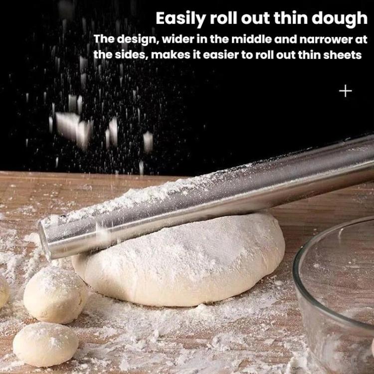 Stainless steel rolling pin flattening a dough ball with flour dusting