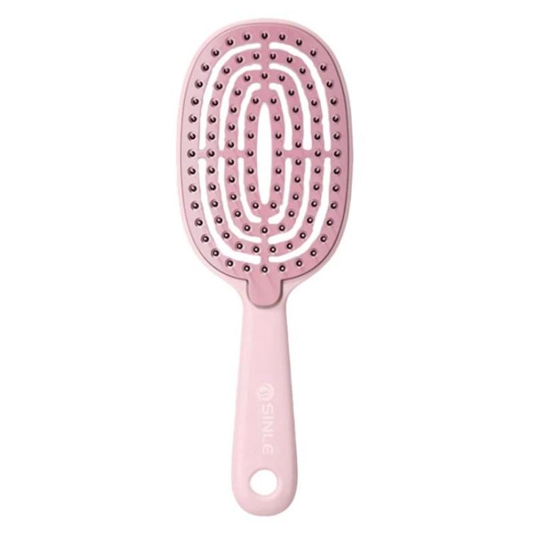 Hair massage comb with oval pin pad and pink handle, dense massage pins