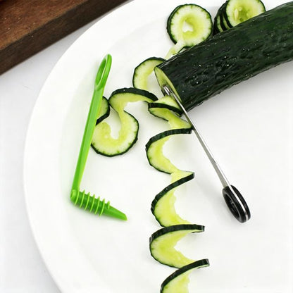 Spiral cucumber slicer tool with green plastic handle and metal cutting auger