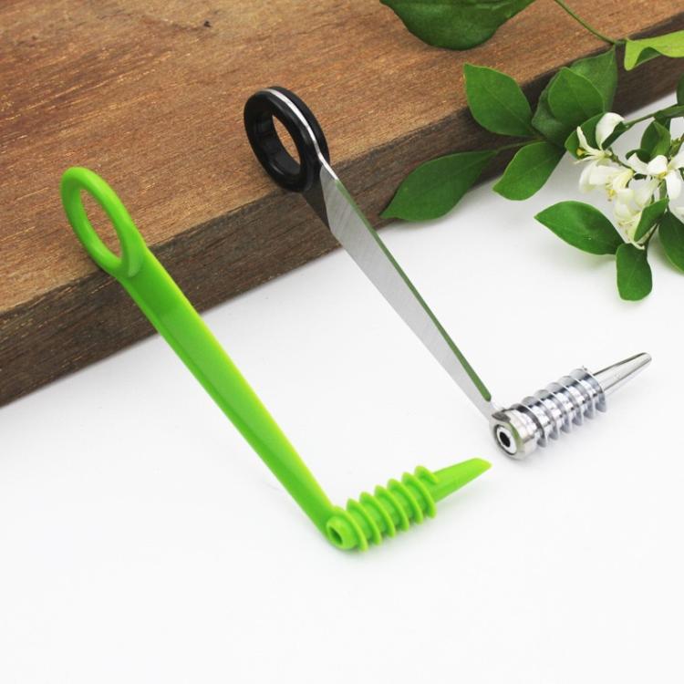 Two-piece spiral cucumber slicer set with green handle and metal auger