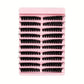 Multiple rows of curled black false lash clusters on segmented strips, pink tray