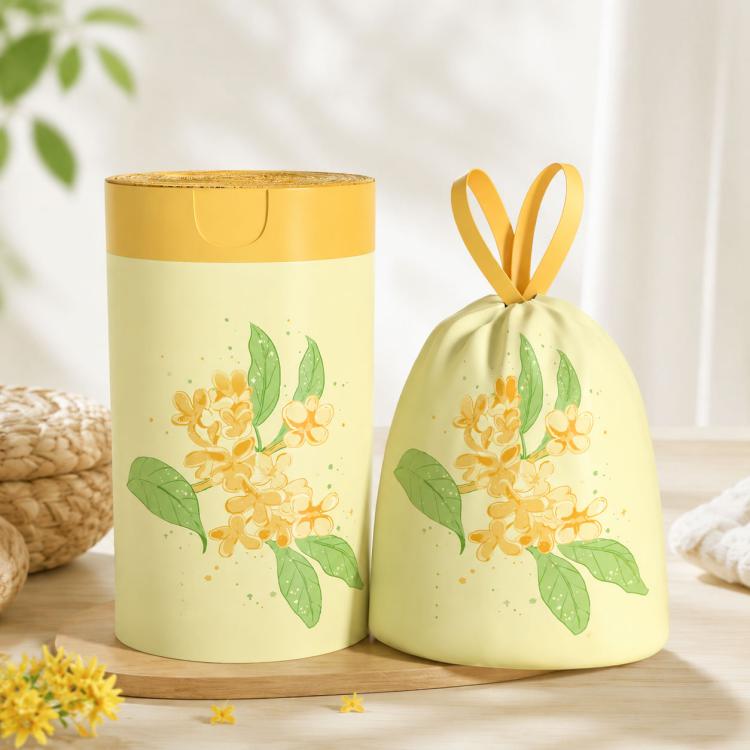 Pale yellow floral drawstring garbage bags with pull handles, tear-free design