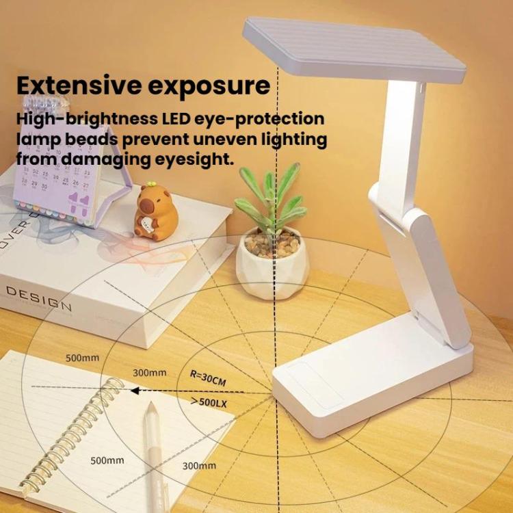 White rechargeable folding desk lamp with extended light head and adjustable arm
