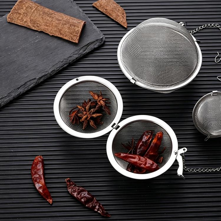 Stainless steel tea spice ball strainer with mesh ball and metal handle, medium