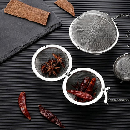 Stainless steel tea spice ball strainer with mesh ball and metal handle, medium