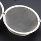 Medium stainless steel circular mesh strainer with metal rim, fine perforations