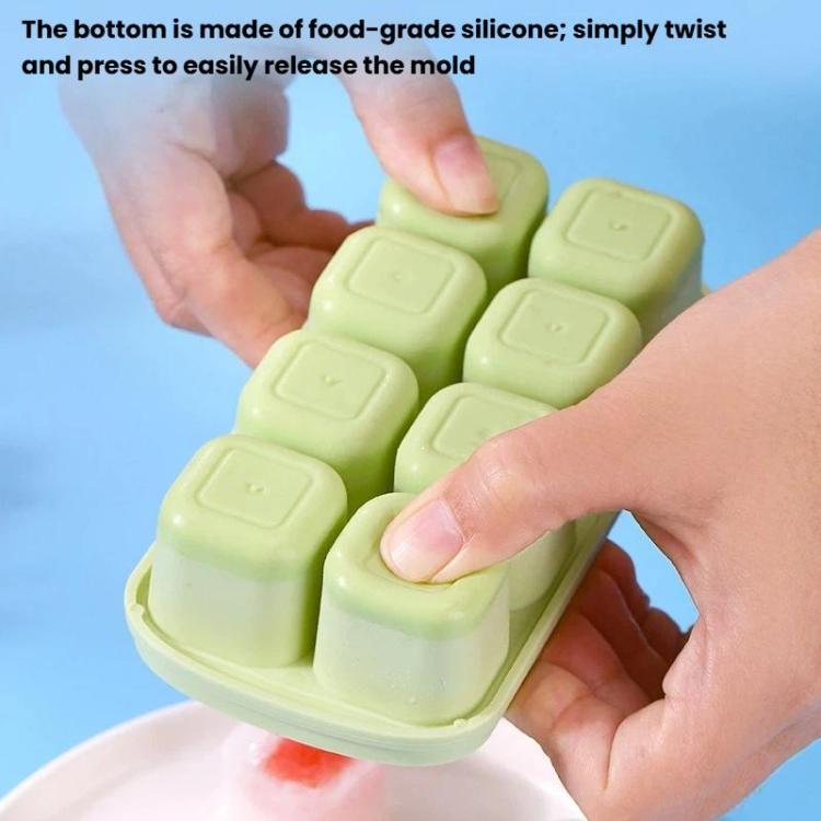 Close-up of mint-green TPE ice cube mold tray with twist-and-press release base