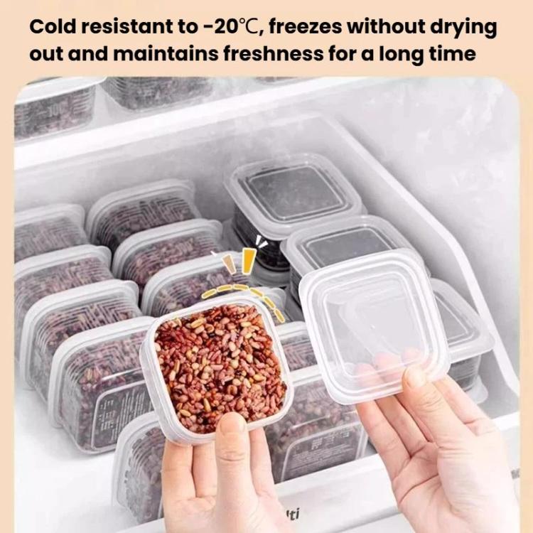 Square freezer containers with clear lids, hands reaching among multiple boxes