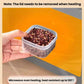 Square freezer food container with clear lid, hand holding a filled container