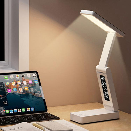 White folding desk lamp with built-in digital clock display on base