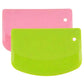 Plastic dough scraper with curved lime green blade and round hole
