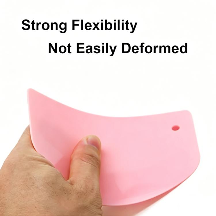 Flexible plastic dough scraper with pink curved blade