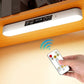 White magnetic under-cabinet lamp with clock display bar and remote control
