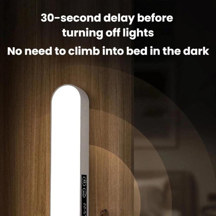 White vertical nightlight-style under-cabinet lamp head with light control icons