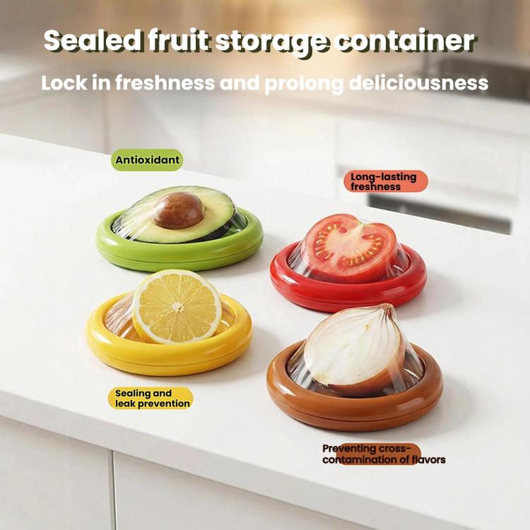 Four sealed fruit storage containers with silicone film seals, showing produce inside