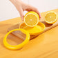 Yellow mini fruit storage container with silicone seal, holding lemon halves