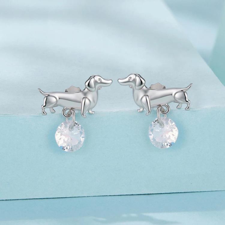 Silver-tone dachshund drop earrings with round crystal pendant, pair shown