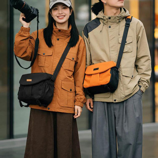 Orange and black DSLR camera shoulder bags with adjustable crossbody straps