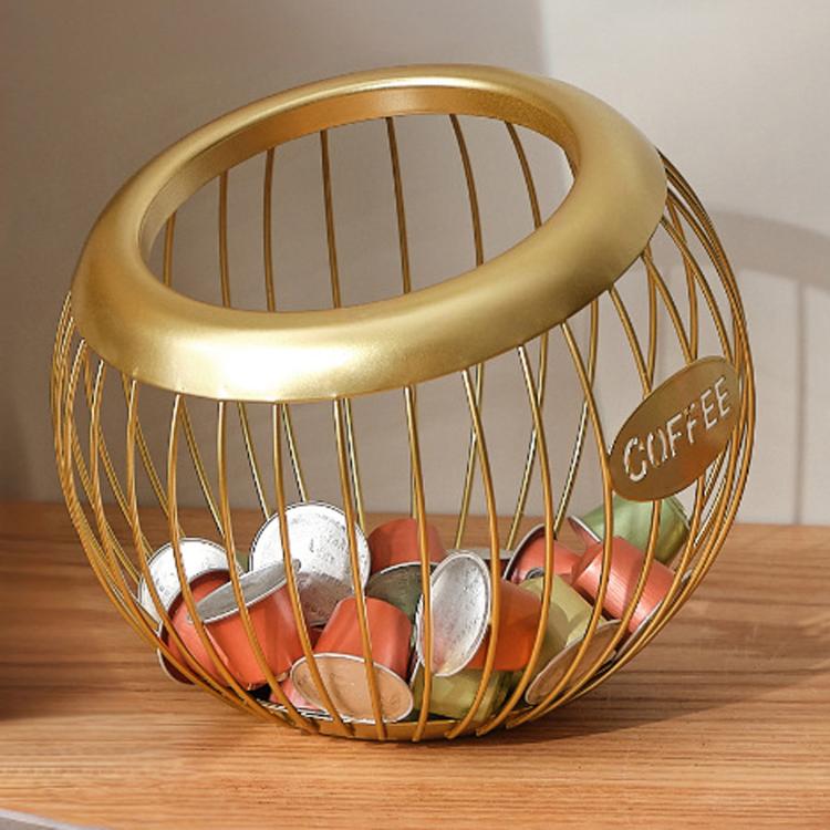 Gold spherical coffee capsule storage rack with oval handle and wire basket
