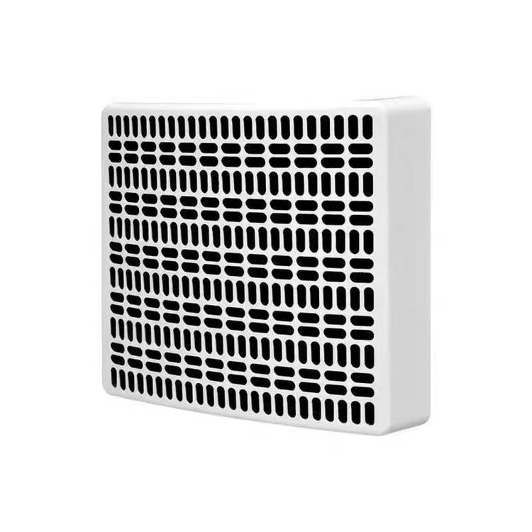 White dehumidifier outer case panel with black vent hole grid