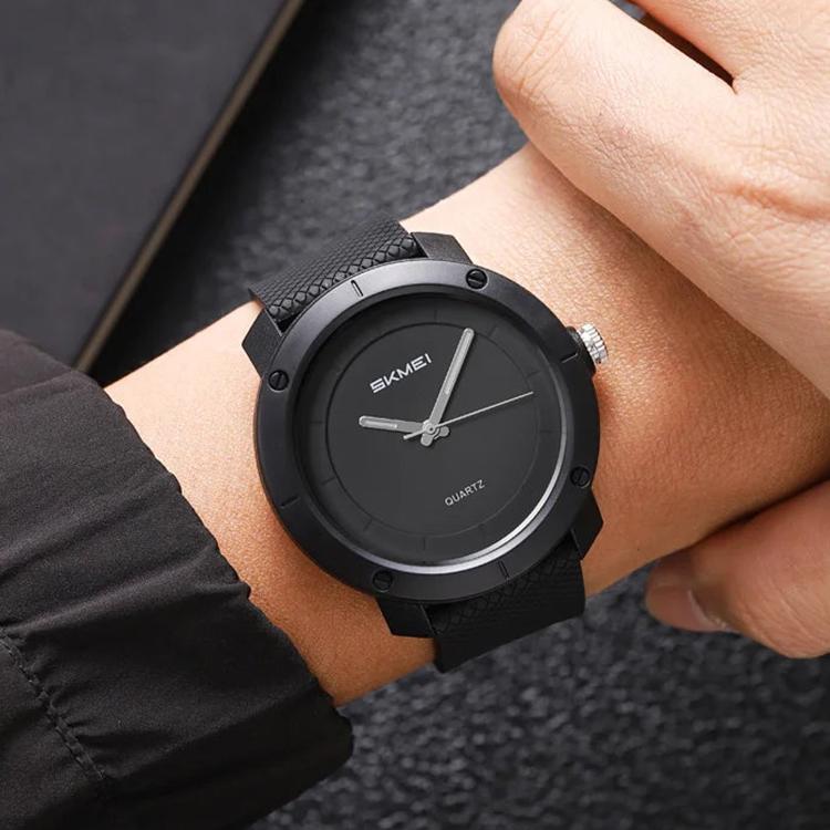 SKMEI unisex watch with black case, black dial, and black textured strap
