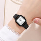 Ladies square quartz watch with black case and black leather strap