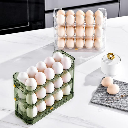 3-tier flip-up egg holders in clear and transparent green with eggs on counter