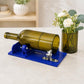 Glass bottle cutter tool with blue base, metal cutting holder and amber bottle clamp