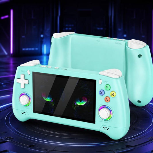 Mint portable handheld game console with front screen, joystick and colored action buttons
