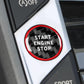 Round engine start/stop sticker with red border ring and black carbon plaid, white “START ENGINE STOP”