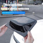 Hands holding a glossy black car roof decorative cover with reflective surface