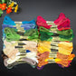 Six-strand embroidery threads, assorted colors, neatly bundled with paper labels