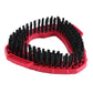 Triangular mop brush head with dense black bristle rows on red plastic frame