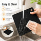 Black square silicone honeycomb table mat coaster being rinsed with water