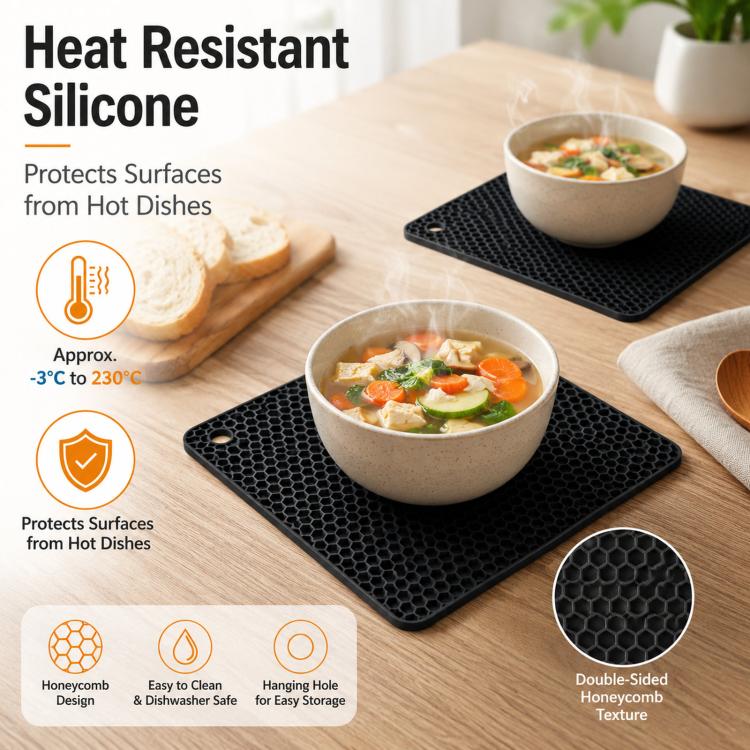 Black square silicone honeycomb table mat coaster protecting bowls on countertop