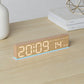 Wood-grain LED digital alarm clock with glowing time digits and blue light edge